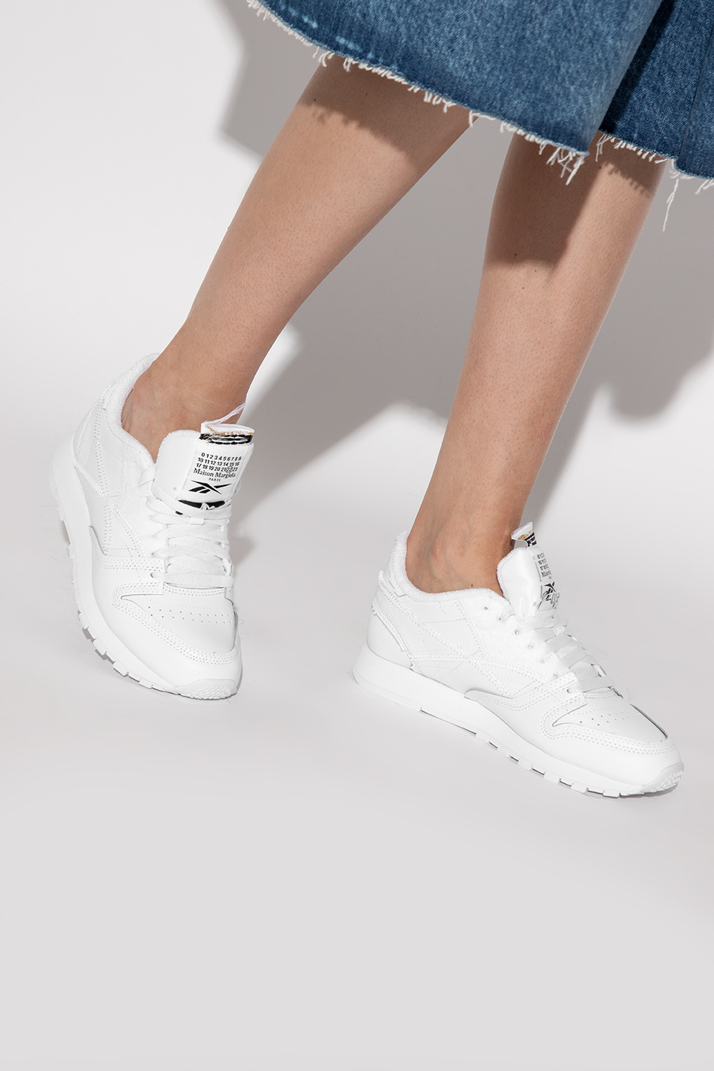 The shoe heel is widen - White 'PROJECT 0 CL MEMORY OF' sneakers